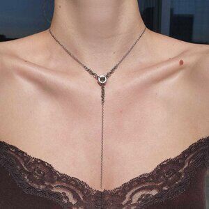 Gothic long silver rosary necklace with a small silver chain